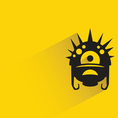alien monster with shadow on yellow background