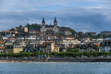 Historic buildings on the shore of Playa de Ondarreta in San Sebastian, Spain