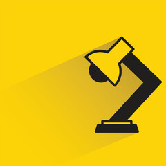 lamp with shadow on yellow background