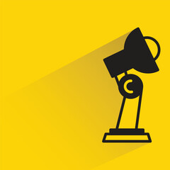 lamp with shadow on yellow background