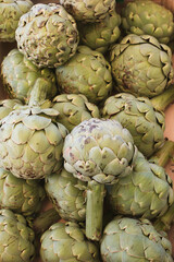 Fototapeta premium Artichokes for sale on a market stall