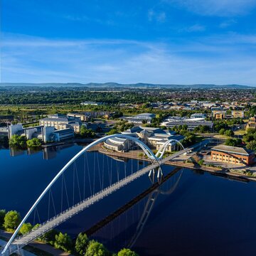 Aerial view of the Infinity Bridge spanning the river Tees in Stockton on