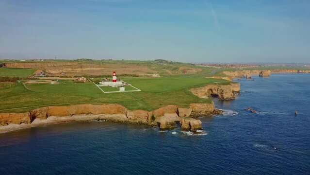 Aerial drone footage of the coastline and magnesium limestone cliffs at marsden