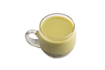 Bubble tea with pistachio and caramel in glass isolated on white, Side view.