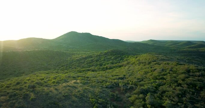 Beautiful view of rural landscapes with rolling hills covered in green vegetation