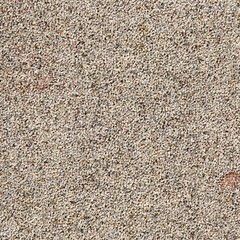 Closeup of quartz sand epoxy decorative floor covering with white and golden particles