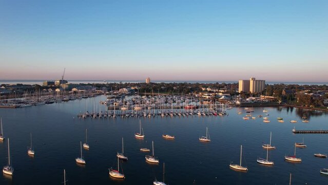 Aerial forward marina of Williamstown in the morning sunrise, scenic panorama