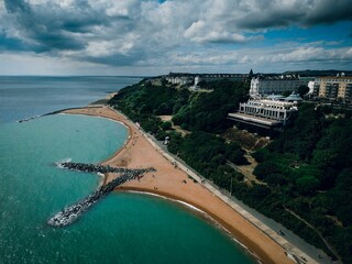 Aerial view of the Leas Cliff Hall and coast in Folkestone, United Kingdom