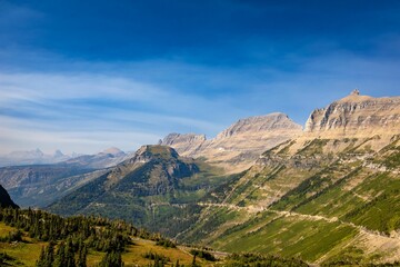 Scenic landscape of mountain forests during daytime in Glacier National Park, Montana