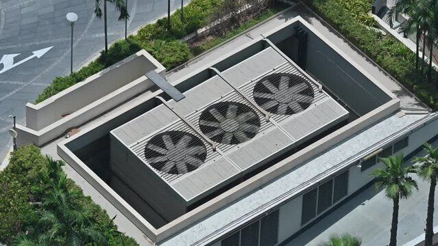 Industrial Air conditioner outdoor units with rotating ventilation fans for cooling radiators. United Arab Emirates