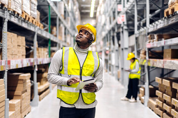 Portrait african american engineer team shipping order detail on tablet export and import,goods,factory,warehouse,international trade,transportation,cargo ship,logistic,distribution.business industry