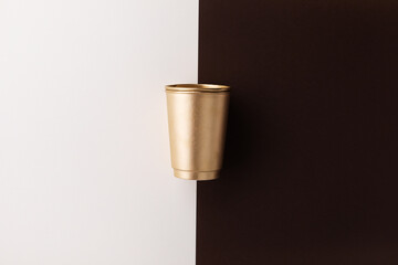 Paper cup of coffee top view.