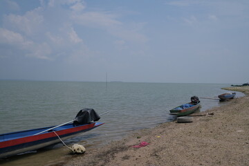 The boat is moored on the river of the fishermen. at Pa Sak Dam, Lop Buri