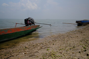 The boat is moored on the river of the fishermen. at Pa Sak Dam, Lop Buri