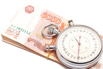 Time is money concept, Stopwatch on Russian ruble banknotes