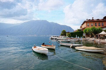 Picturesque landscape with a  scenic view on the Lago di Como, big blue lake surrounded by green hill.