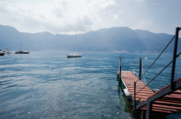 Landing pier for small boats on Lake Como in Italy.