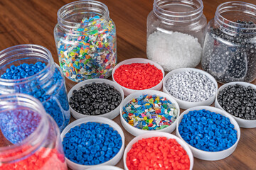 White plastic grain, plastic polymer granules,hand hold Polymer pellets, Raw materials for making...