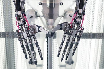 Five fingered robot arm and hands close up. Robotic technology