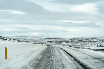 Winter snow road in Iceland with mountains
