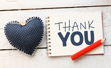 THANK YOU words in notebook.