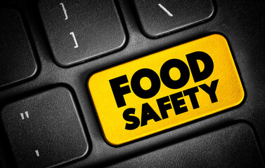 Food Safety text button on keyboard, concept background
