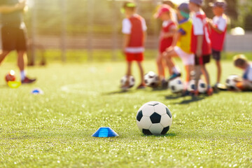 Soccer, training and children on sports field. Football equipment at sports grass pitch. Soccer...