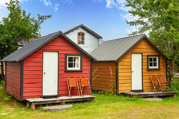 Fototapeta na wymiar Wooden camping cabins at a campsite in New Zealand