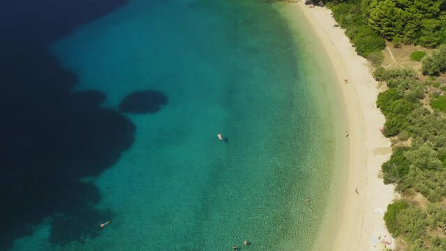 Aerial view of pebble Duba beach in Makarska riviera, the Adriatic Sea, Croatia