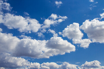 Naklejka na ściany i meble blue sky with fluffy clouds 