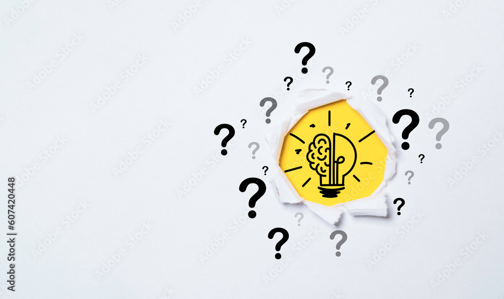 Poster lightbulb drawing inside of punch paper with questions mark for creative thinking idea and problem s