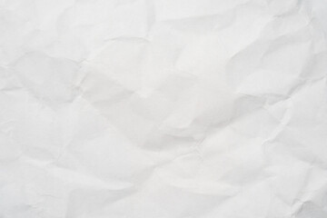 Closeup of white crumpled paper for texture background.