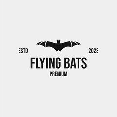 Creative flying bats logo design concept illustration idea