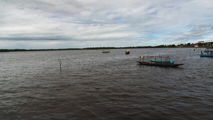 View of fishing boats moored on the Rio das Almas in the city of Taperoa, Bahia.