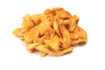 Dried melon slices isolated on a white background.