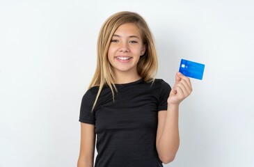 Photo of happy cheerful smiling positive beautiful caucasian teen girl wearing sportswear  over white wall recommend credit card