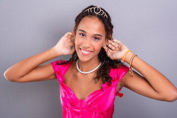 Teenage girl, beautiful, wearing pink color dress.