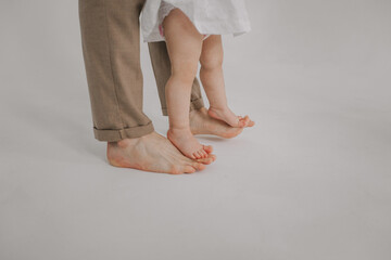 dad and baby feet