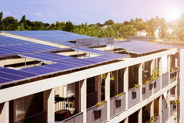 Solar Panel on Apartment Building Rooftop. Residential Modern Building with Solar Panels System on...