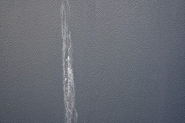 efflorescence, stain on the concrete wall white sediment formed on surfaces with component of...
