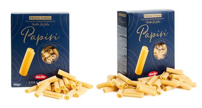Munich, 05.22.2023: box of Italian Barilla brand "papiri" (papyrus) pasta surrounded by the actual product /  noodles isolated over transparency, two perspectives, limited edition, new shape