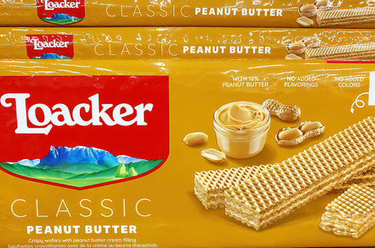 Viersen, Germany - May 9. 2023: Closeup of packs Loacker peanut butter waffles in shelf of german supermarket