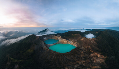 Aerial Drone view of Danau volcano Kelimutu in Ende, Flores island. Sunrise. Colorful crater lake. East Nusa Tenggara Aerial view © Mathias