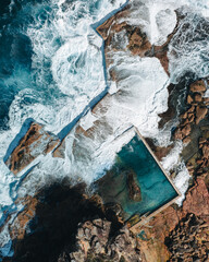 North Curl Curl rock pool with incoming waves.