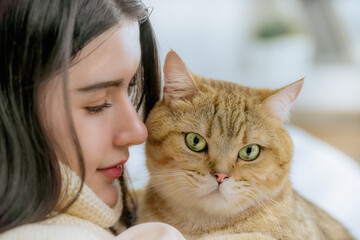 Closeup Portrait of Cute Cat with Young Woman, White Background