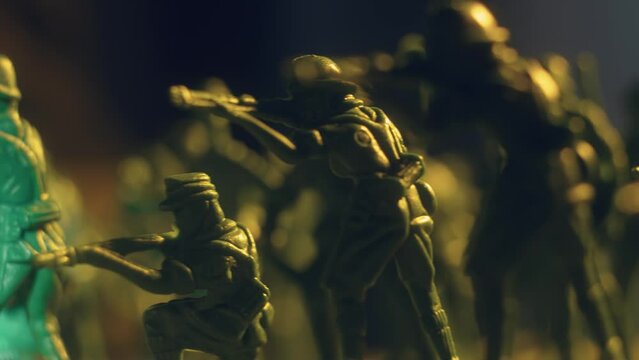 Ready for attack toy soldiers and battle troopers in macro shooting. Violence war resistance and peace without armored invasion