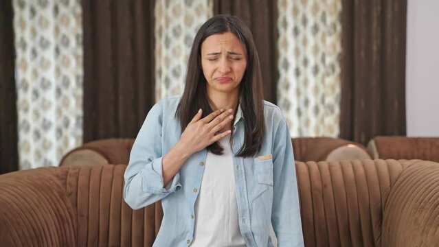 Indian woman having acidity problem