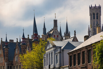 View of the roofs of the houses in the historic center of Bruges, with a good number of pointed towers.