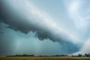 Fotobehang Storm over the field © Kajetan