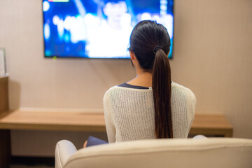 Woman watch TV at home